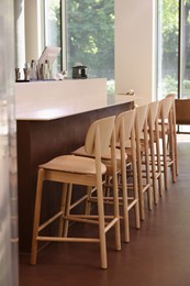Photo of Modern cafe with stylish furniture. Interior design