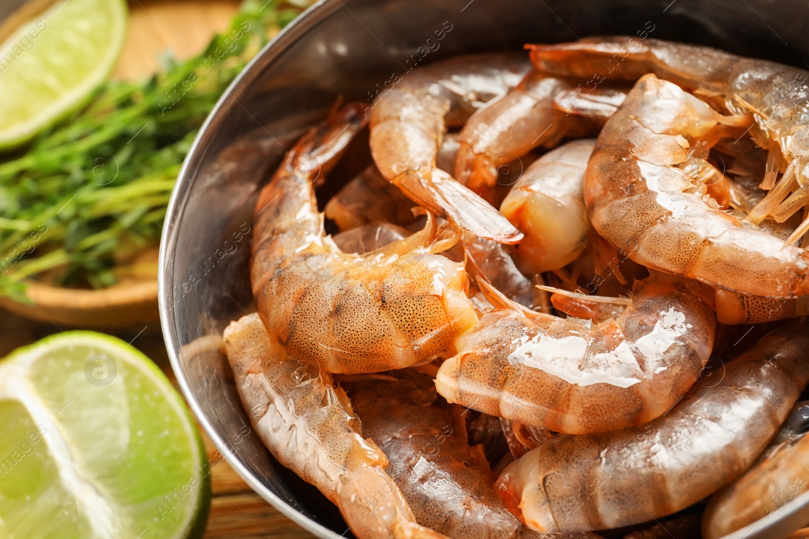 Photo of Bowl with fresh shrimps, closeup