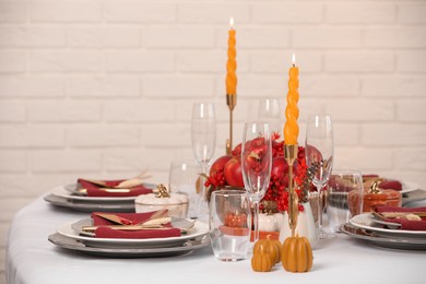 Elegant festive setting with autumn decor on table