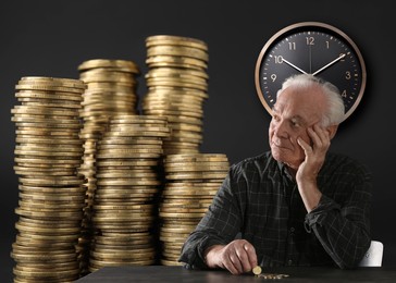Image of Pension plan. Elderly man with coins on dark background