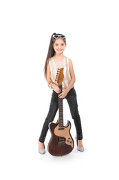 Photo of Little pretty girl in mother's shoes with guitar isolated on white