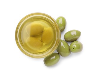 Photo of Cooking oil in bowl and olives on white background, top view