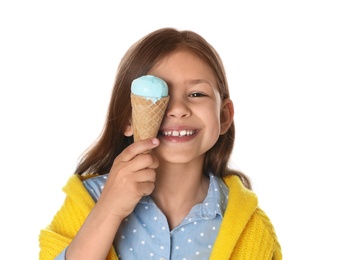 Photo of Adorable little girl with delicious ice cream on white background