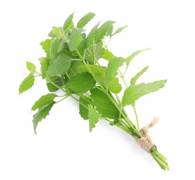 Photo of Bunch of fresh green lemon balm isolated on white. top view