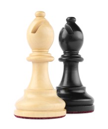 Photo of Different bishops on white background. Chess pieces