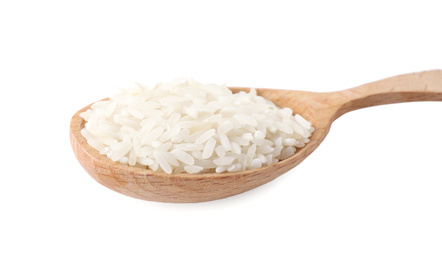 Photo of Uncooked rice in wooden spoon isolated on white