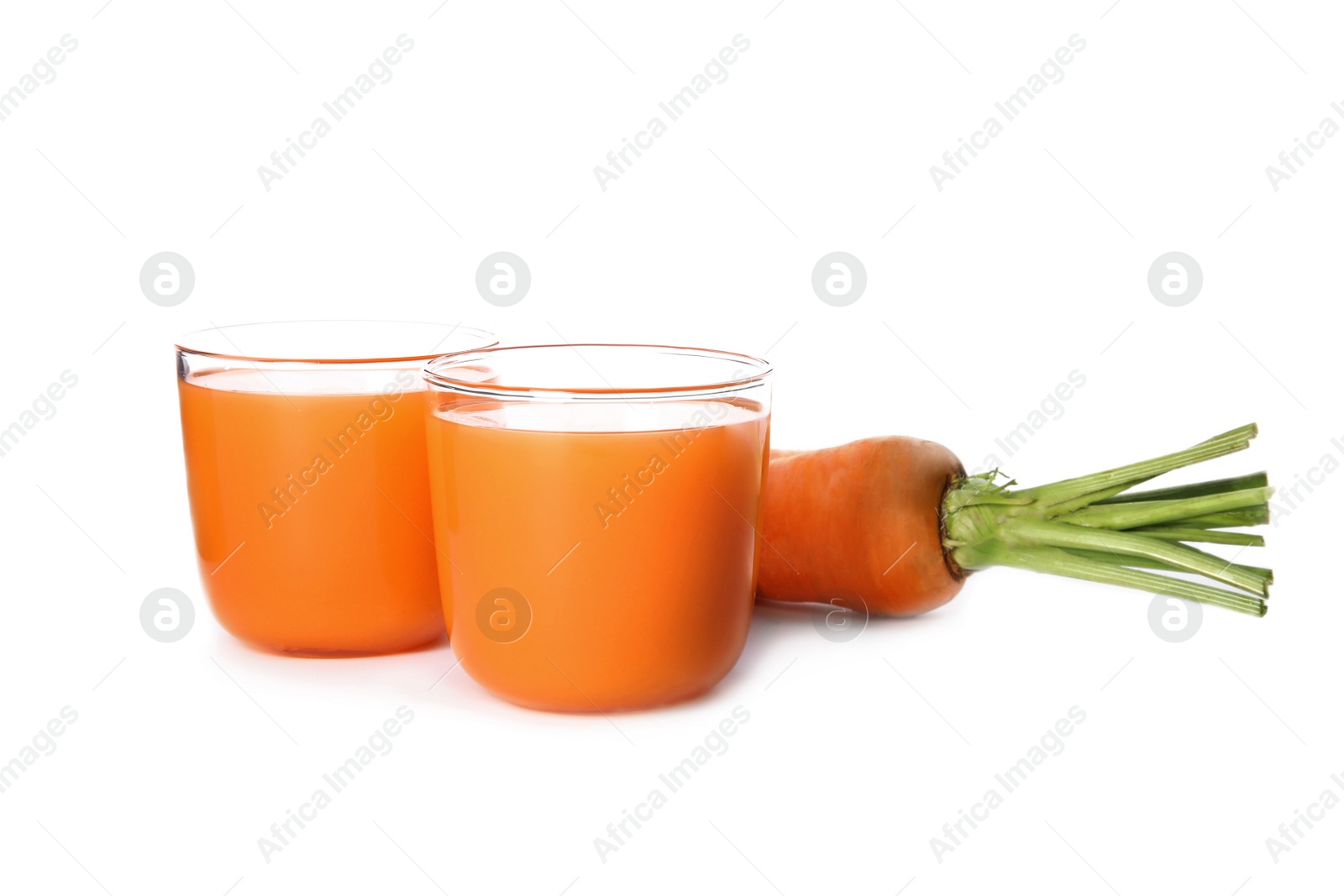 Photo of Freshly made carrot juice on white background