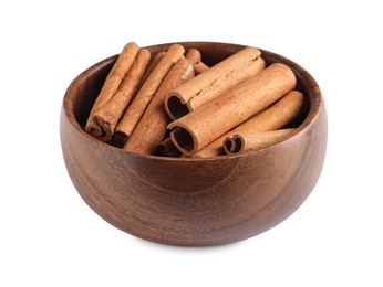 Photo of Cinnamon sticks in bowl isolated on white