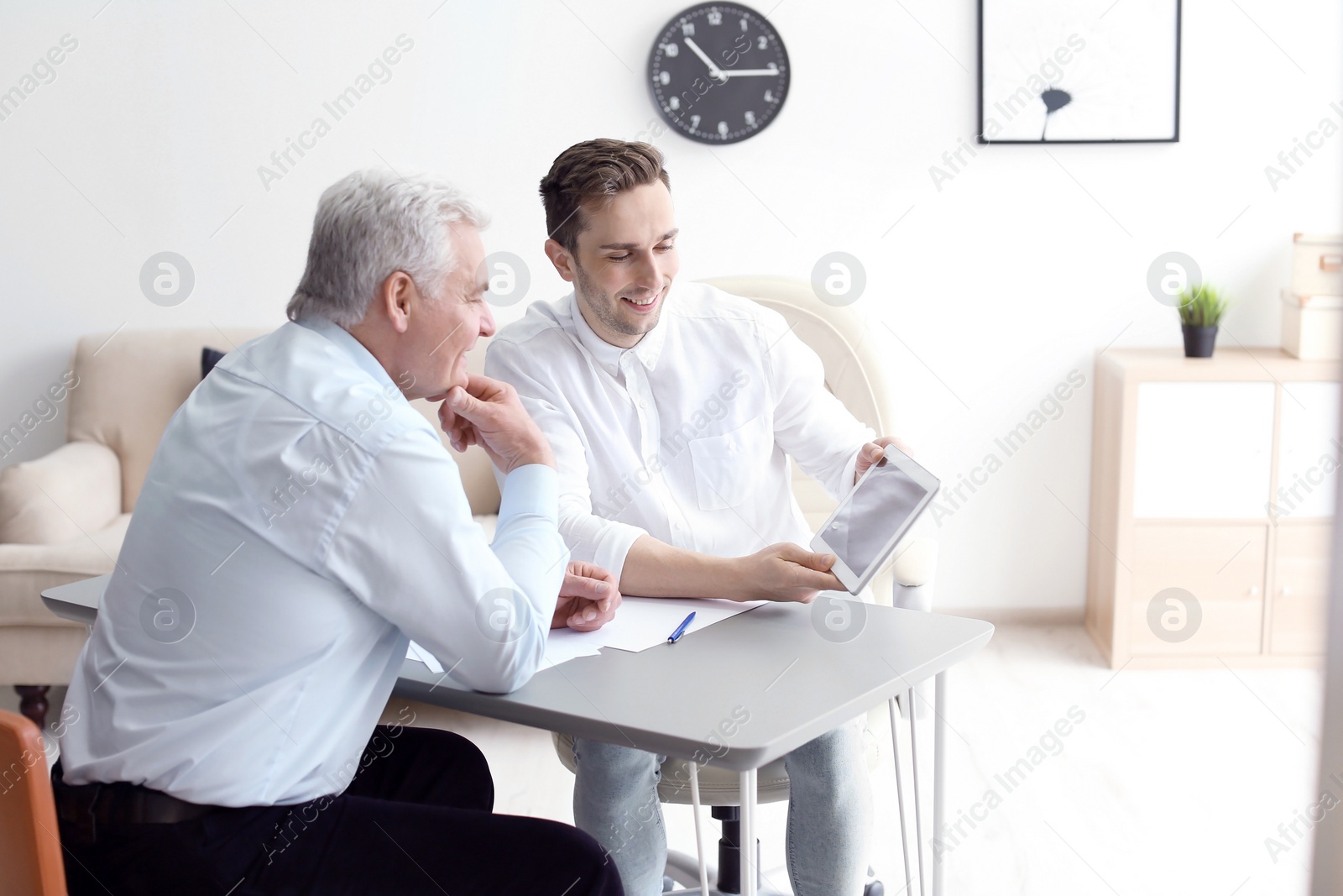 Photo of Human resources manager conducting job interview with applicant in office