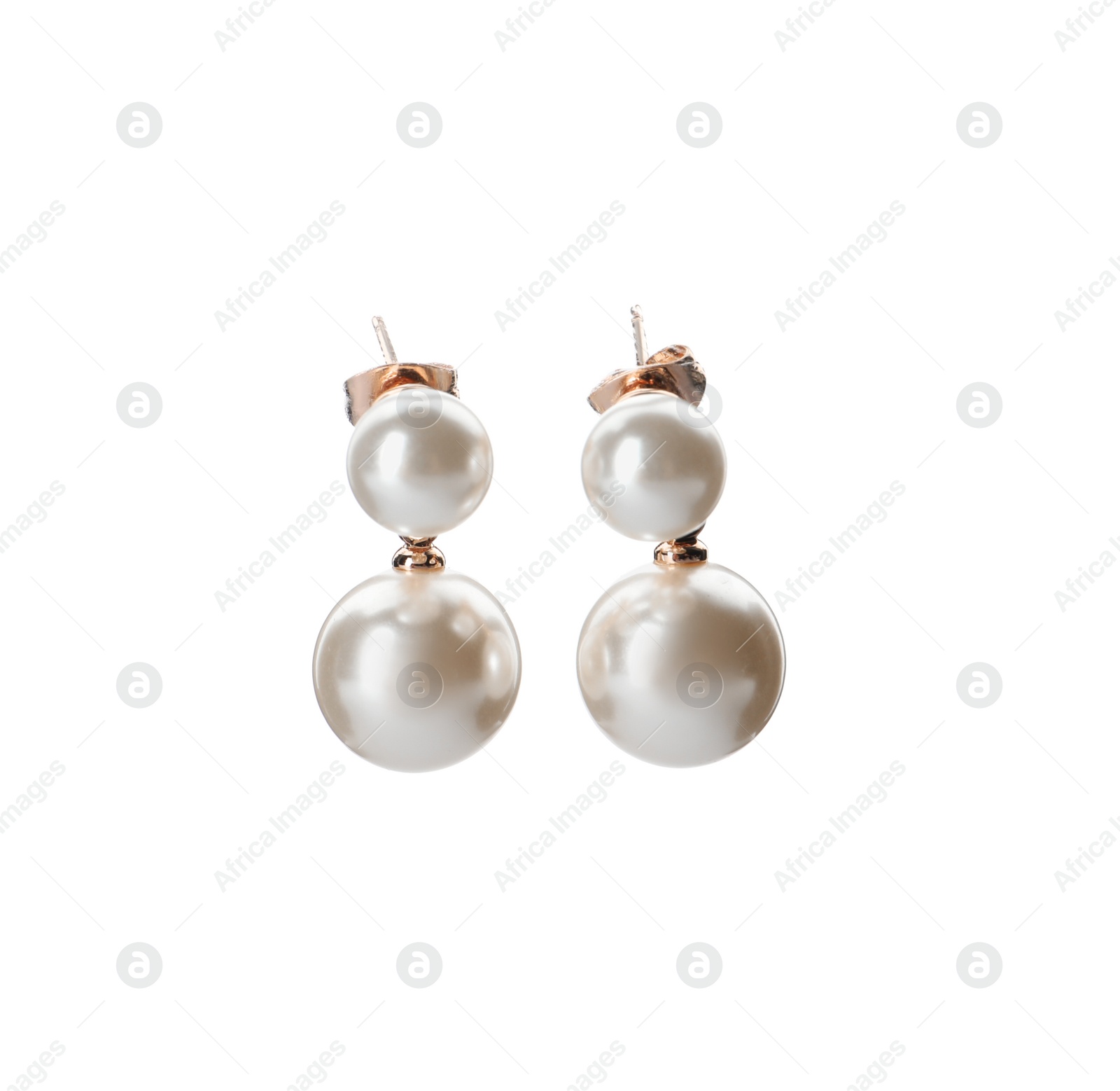 Photo of Elegant golden earrings with pearls on white background