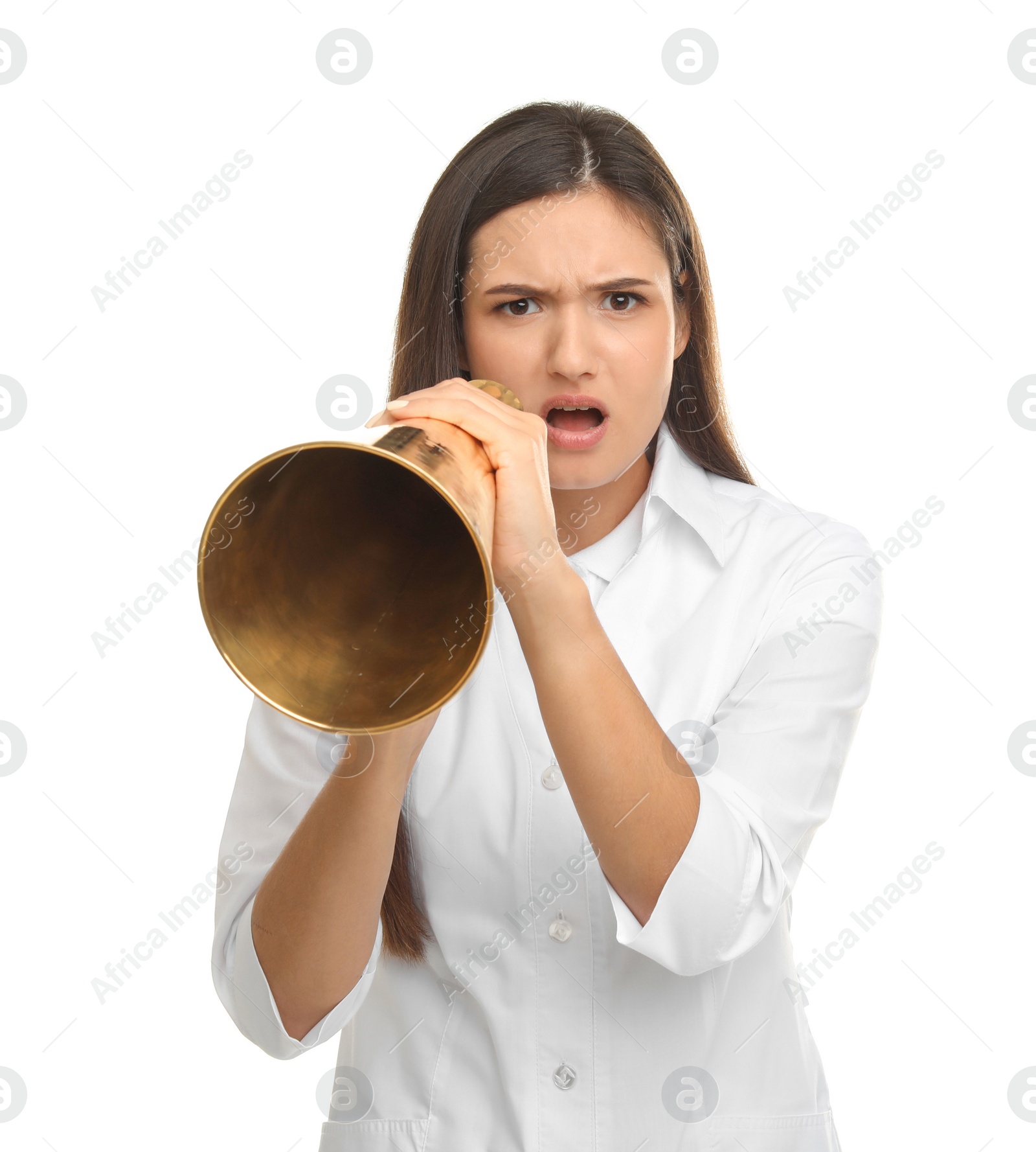 Photo of Young female doctor using megaphone on white background