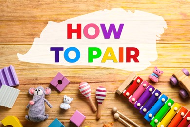 Image of How To Pair. Different toys on wooden background, flat lay