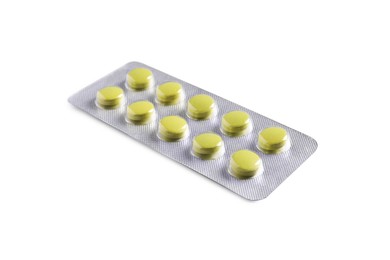 Photo of Blister of pills on white background. Medicinal treatment