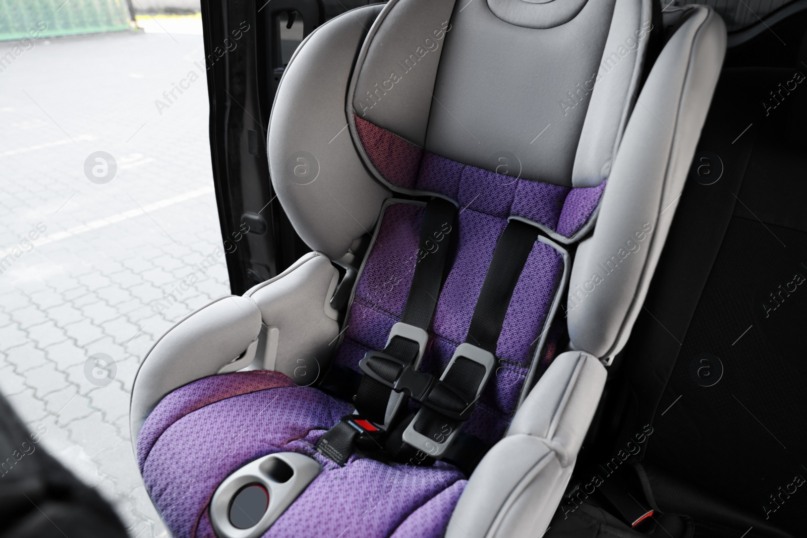 Photo of Empty modern child safety seat inside car