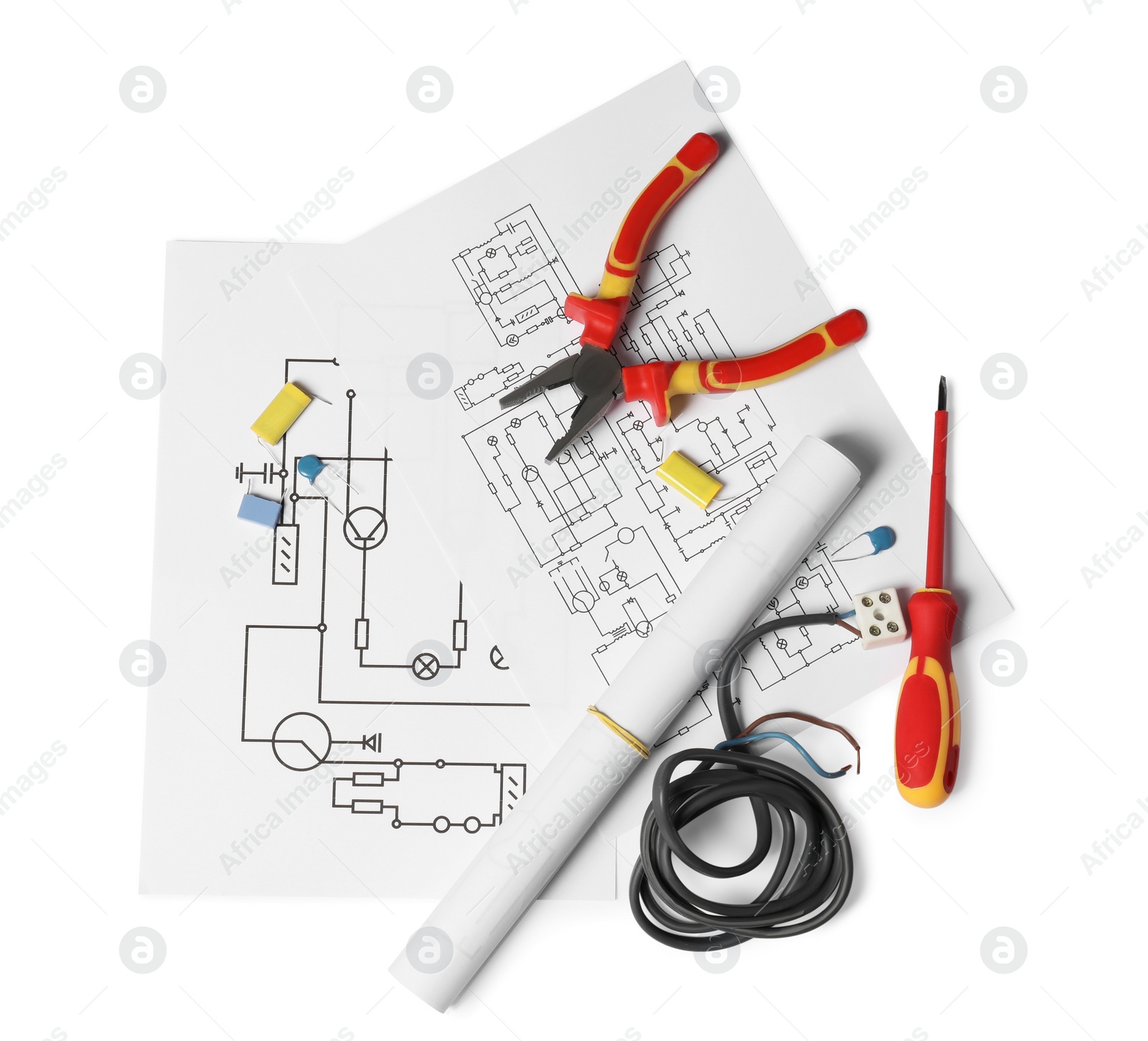 Photo of Wiring diagrams, wires and tools isolated on white, top view