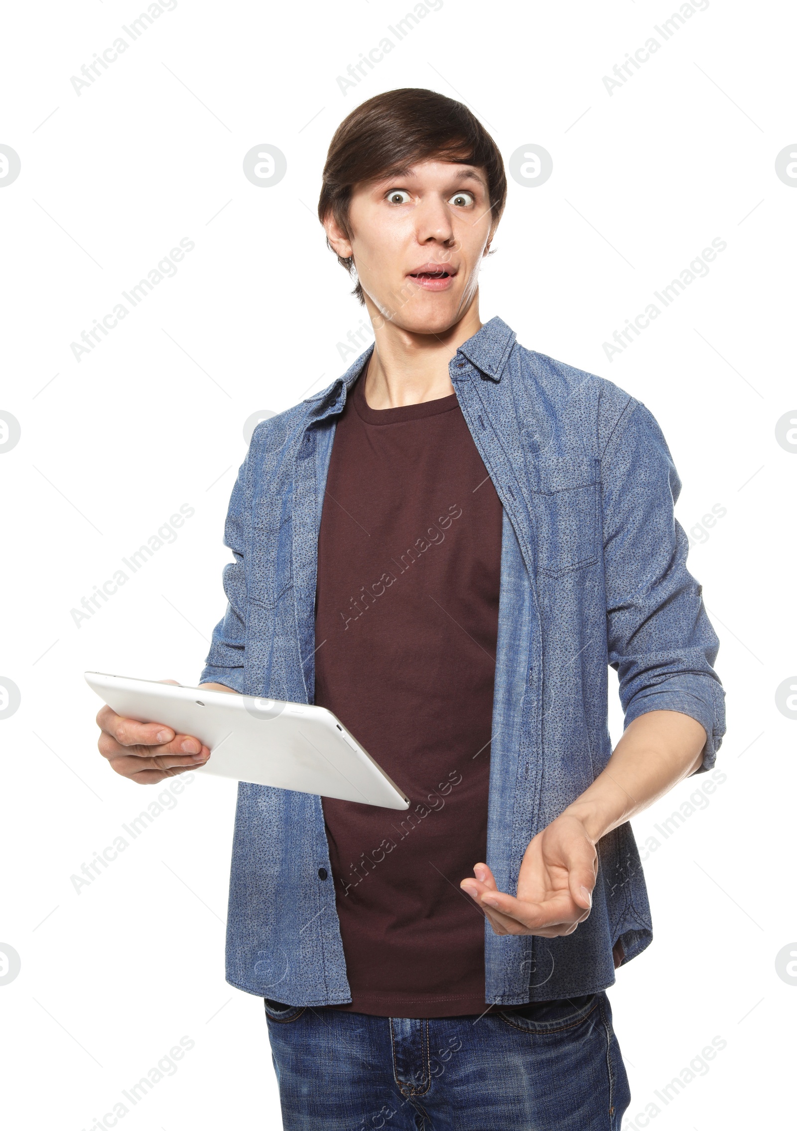 Photo of Portrait of confident young man with tablet on white background