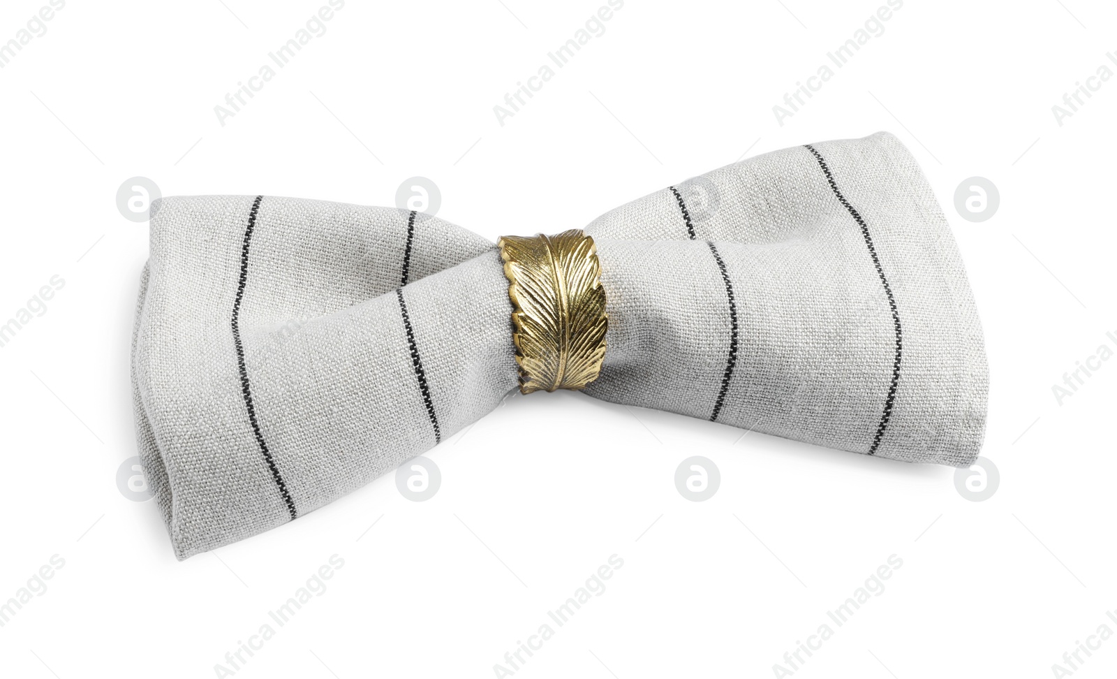 Photo of Napkin with decorative ring for table setting isolated on white