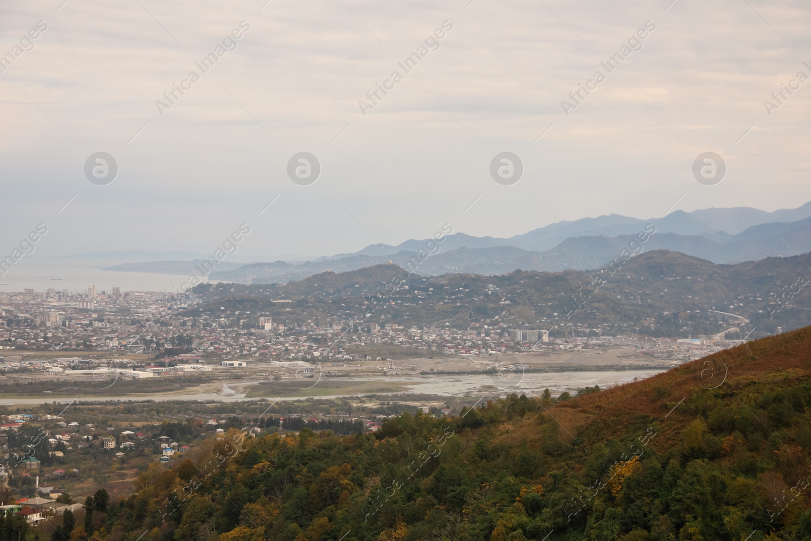 Photo of Picturesque view of beautiful valley, city and mountains