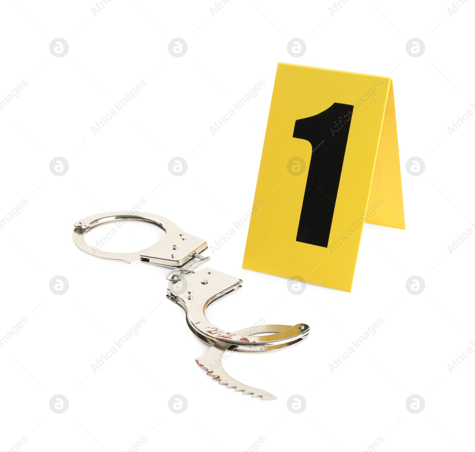 Photo of Handcuffs and crime scene marker with number one isolated on white