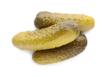Tasty crunchy pickled cucumbers on white background, top view