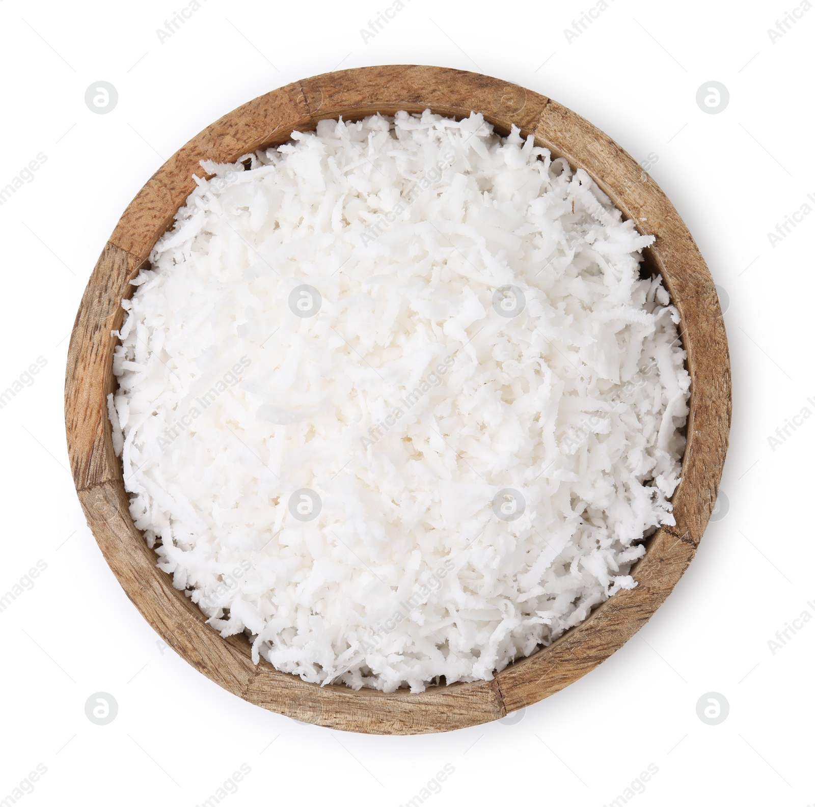 Photo of Coconut flakes in bowl isolated on white, top view