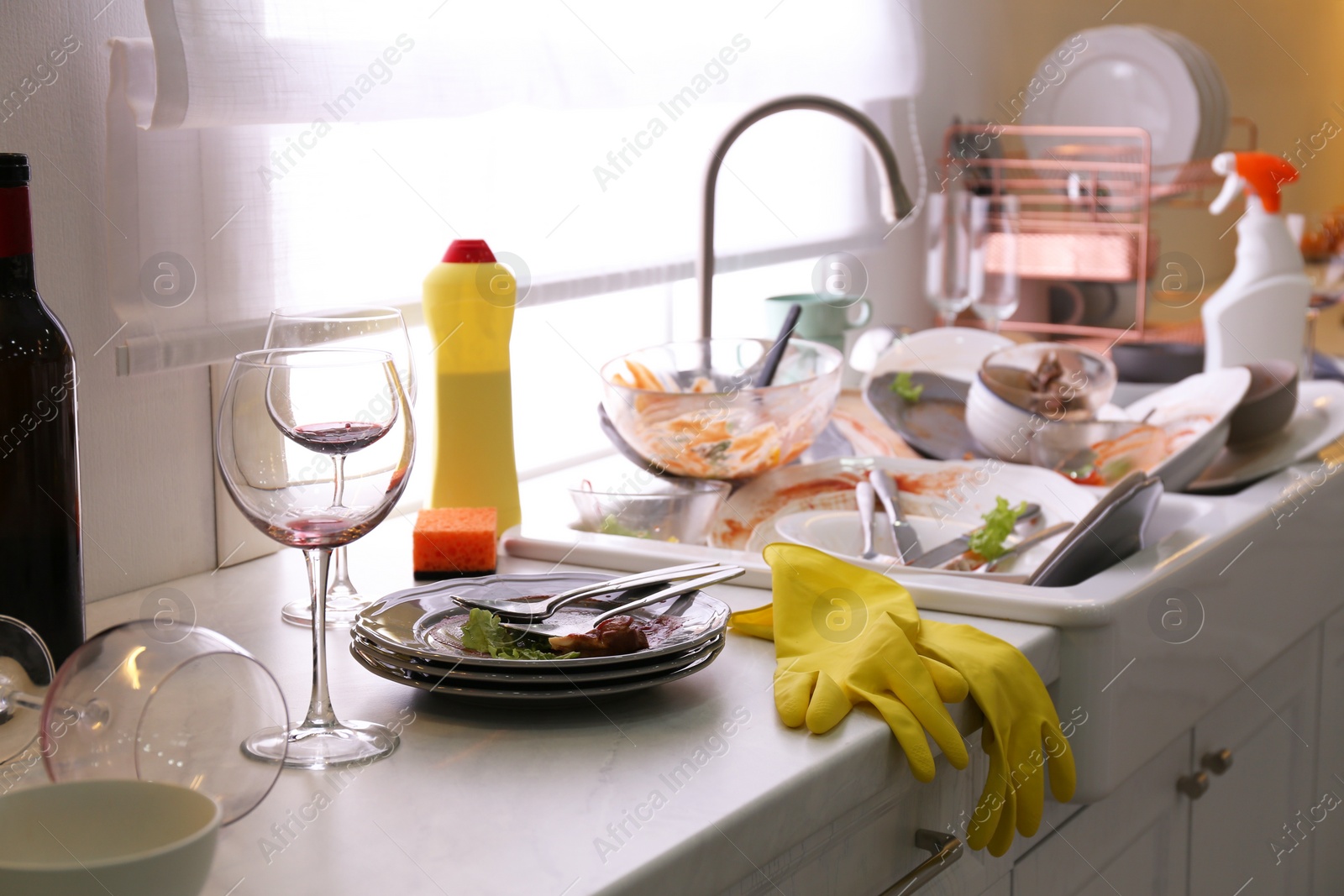 Photo of Dirty dishes in kitchen after new year party