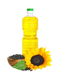 Photo of Sunflower cooking oil, seeds and yellow flower on white background