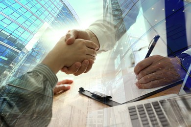 Image of Deal or partnership concept. Double exposure with cityscape and photo of businesspeople shaking hands