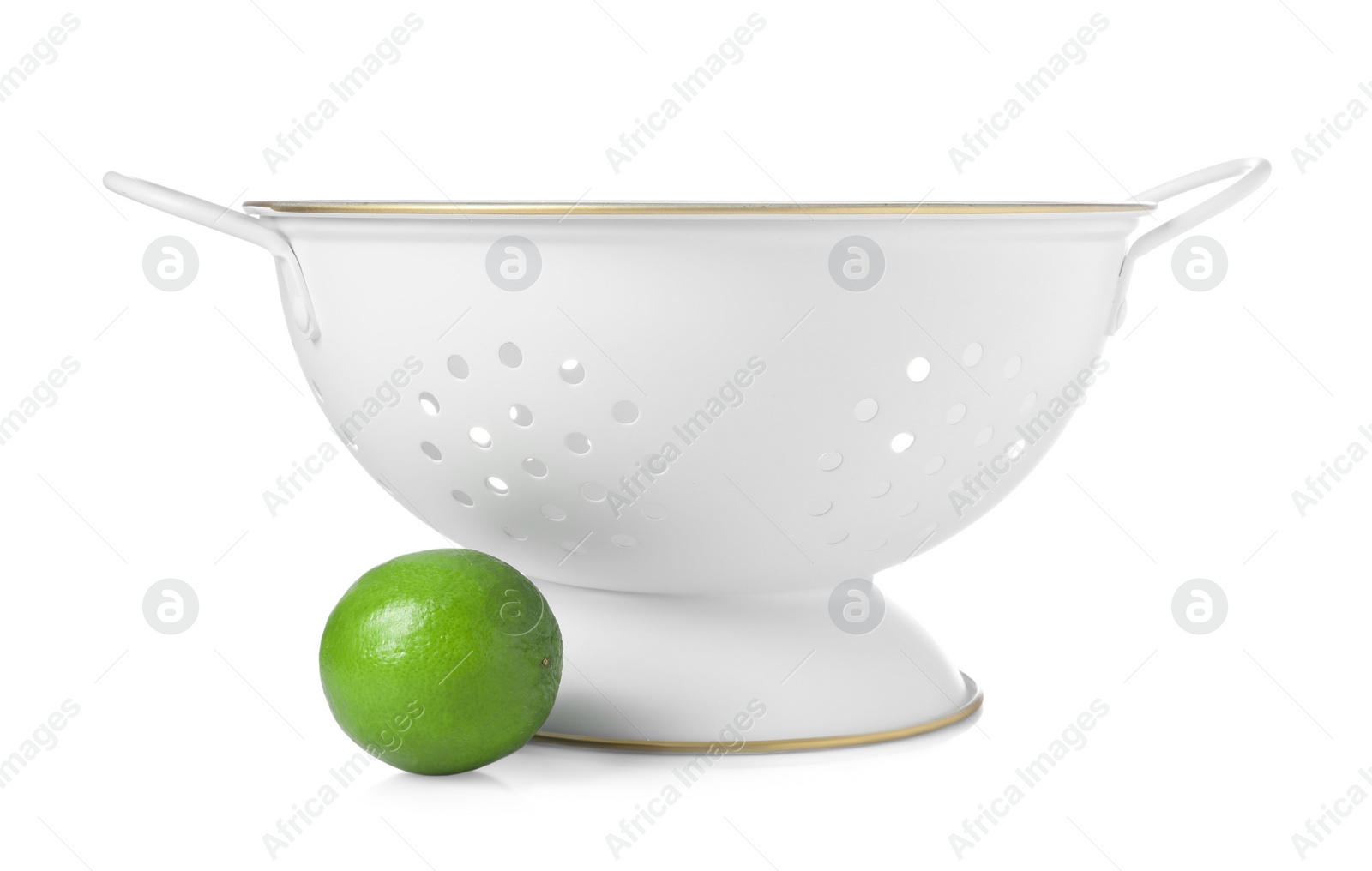 Photo of Colander with fresh lime isolated on white