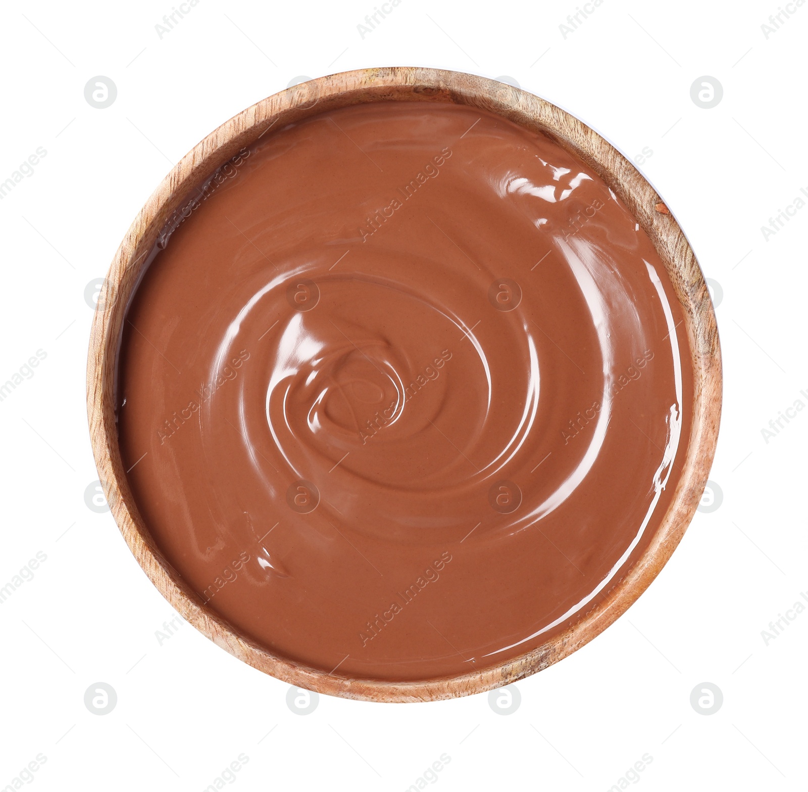 Photo of Tasty melted milk chocolate in bowl isolated on white, top view