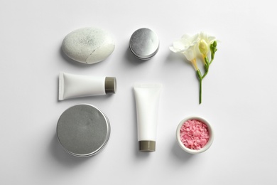 Flat lay composition with cosmetic products on white background