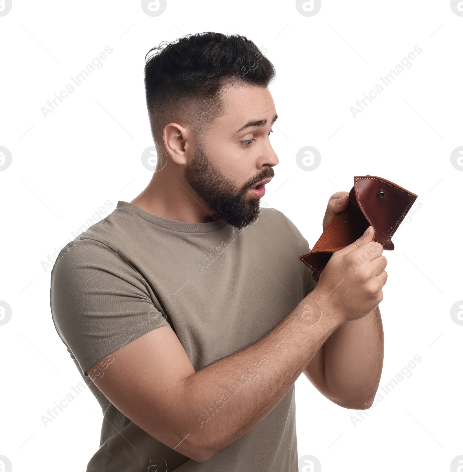 Photo of Confused man showing empty wallet on white background