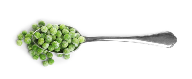 Photo of Frozen peas in spoon isolated on white, top view. Vegetable preservation