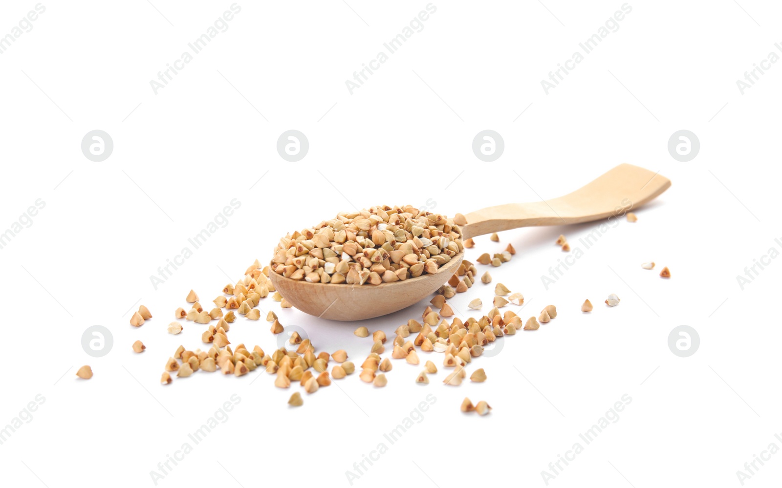 Photo of Uncooked green buckwheat grains in spoon isolated on white