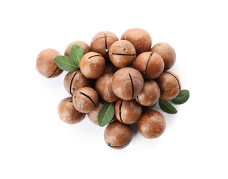 Photo of Pile of organic Macadamia nuts on white background, top view