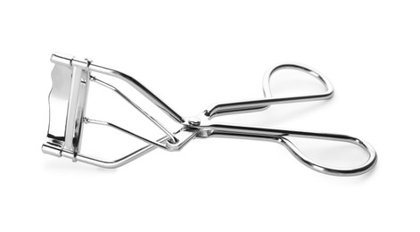 Photo of Eyelash curler isolated on white. Makeup tool