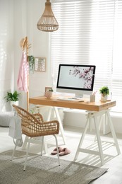 Photo of Stylish home office interior with comfortable workplace