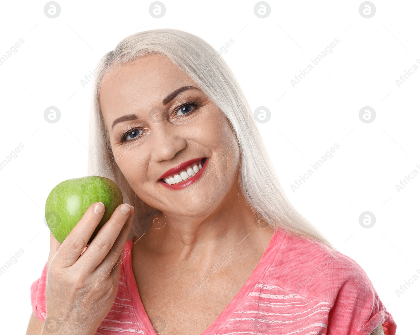 Photo of Smiling woman with perfect teeth and green apple on white background