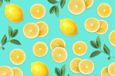 Image of Flat lay composition with lemons and leaves on aquamarine blue background