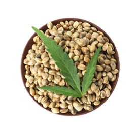 Photo of Bowl of hemp seeds with green leaf on white background, top view