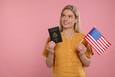 Photo of Immigration. Happy woman with passport and American flag on pink background, space for text