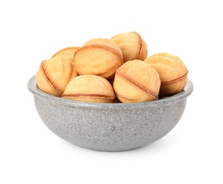 Photo of Bowl of delicious nut shaped cookies with condensed milk on white background