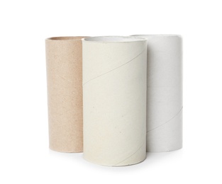 Photo of Empty toilet paper rolls on white background