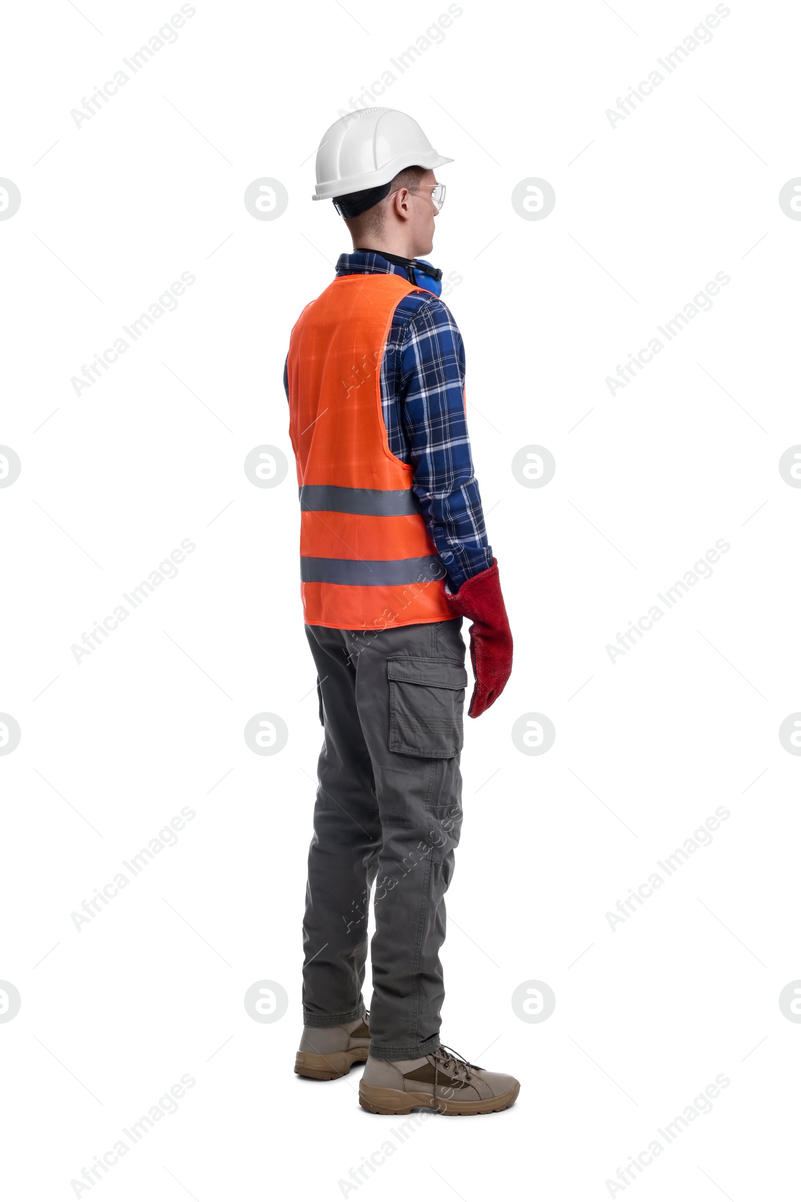 Photo of Young man wearing safety equipment on white background