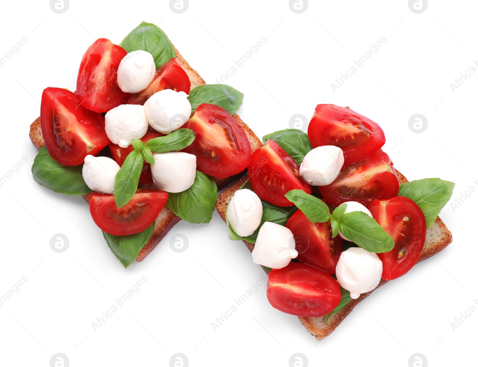 Photo of Delicious Caprese sandwiches with mozzarella, tomatoes, basil and pesto sauce isolated on white, top view
