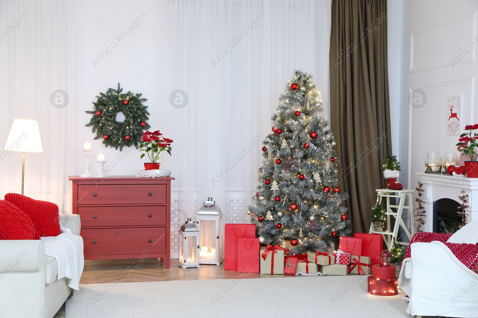 Photo of Living room with fireplace and Christmas decorations. Festive interior design