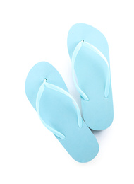 Light blue flip flops isolated on white, top view. Beach accessory