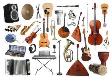 Collection of different musical instruments on white background