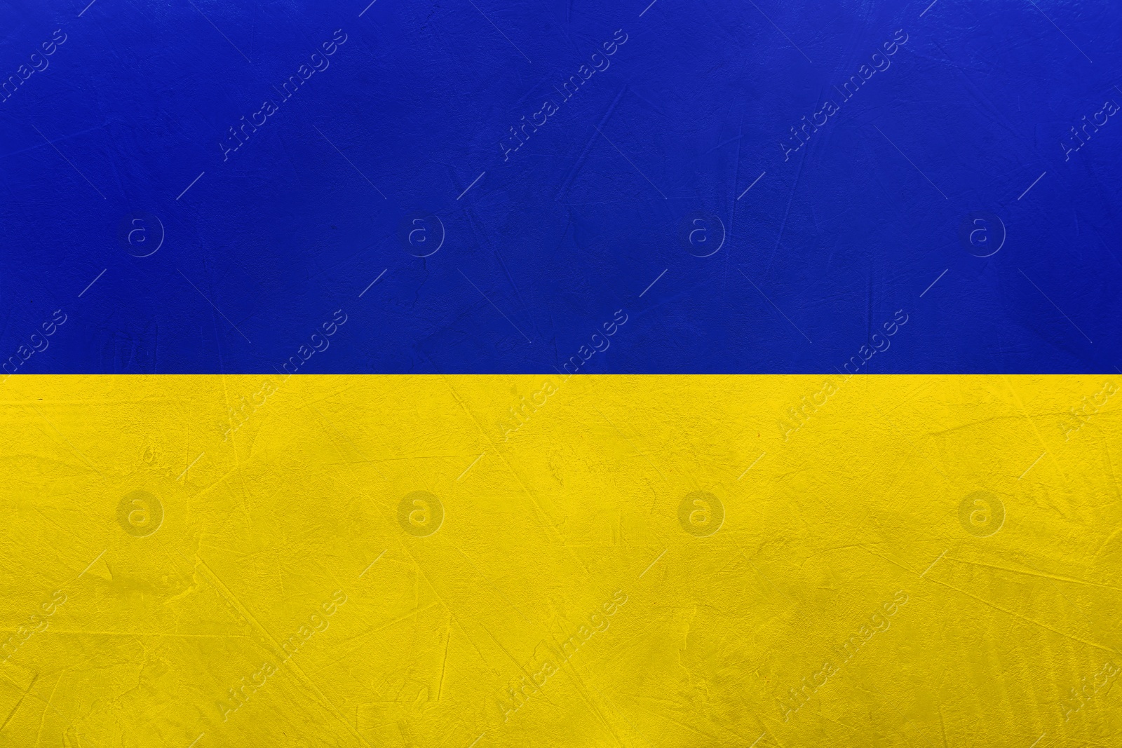 Image of National flag of Ukraine painted on textured surface