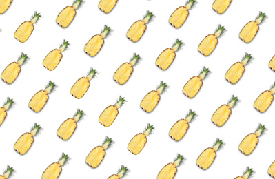 Image of Pattern of pineapple halves on white background